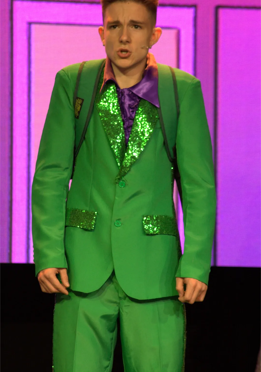 Green suit with sequin side panels