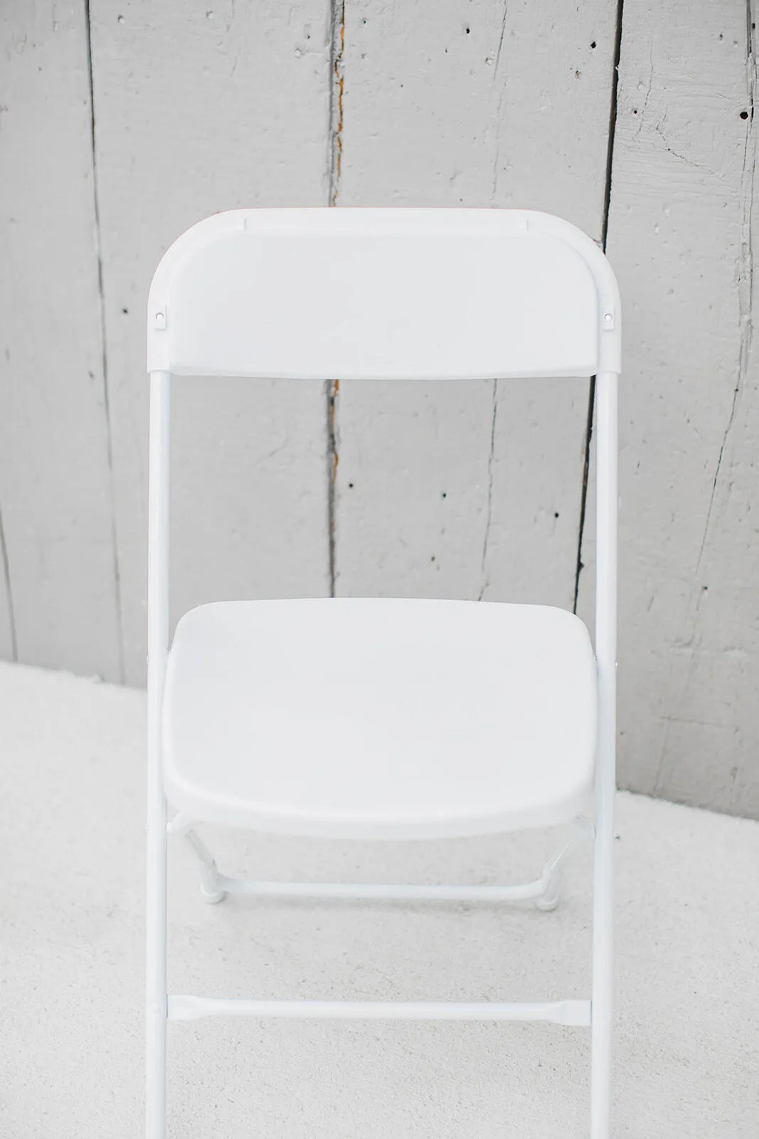 white folding chairs