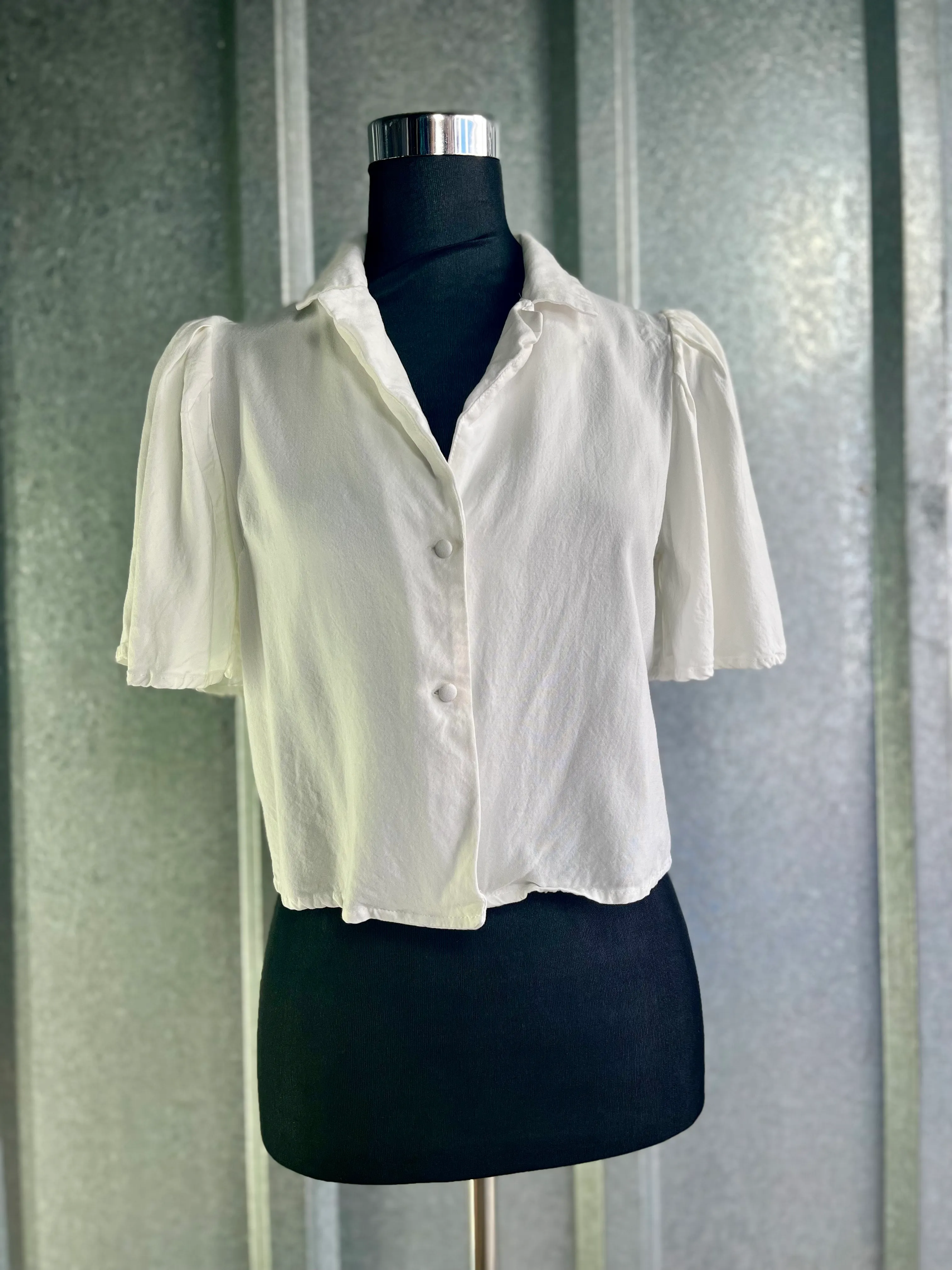 10. WOMENS WHITE TOP SIZE S