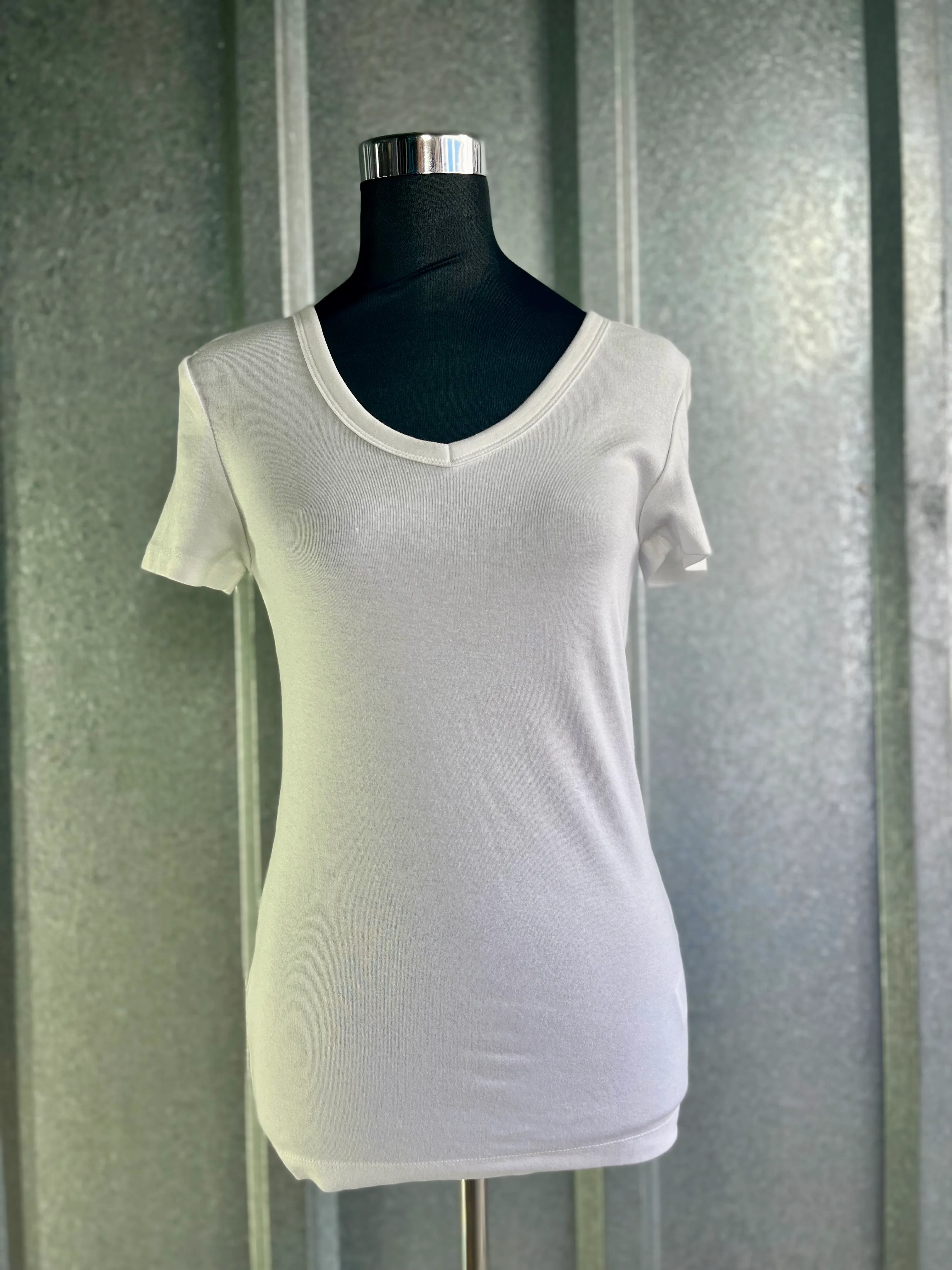 9. WOMENS WHITE TOP SIZE S