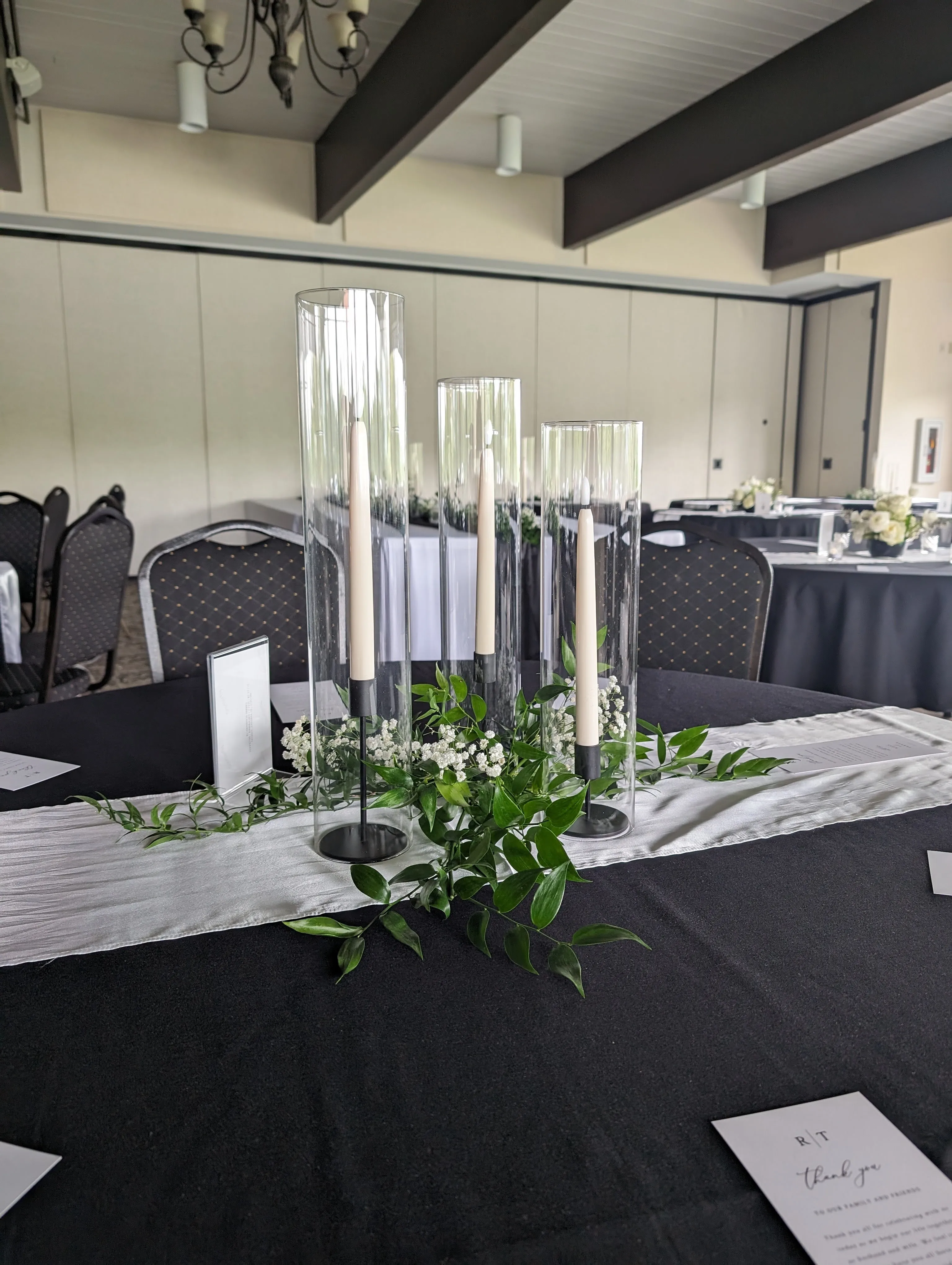 Greenery Wreath Around Cylinder Trios