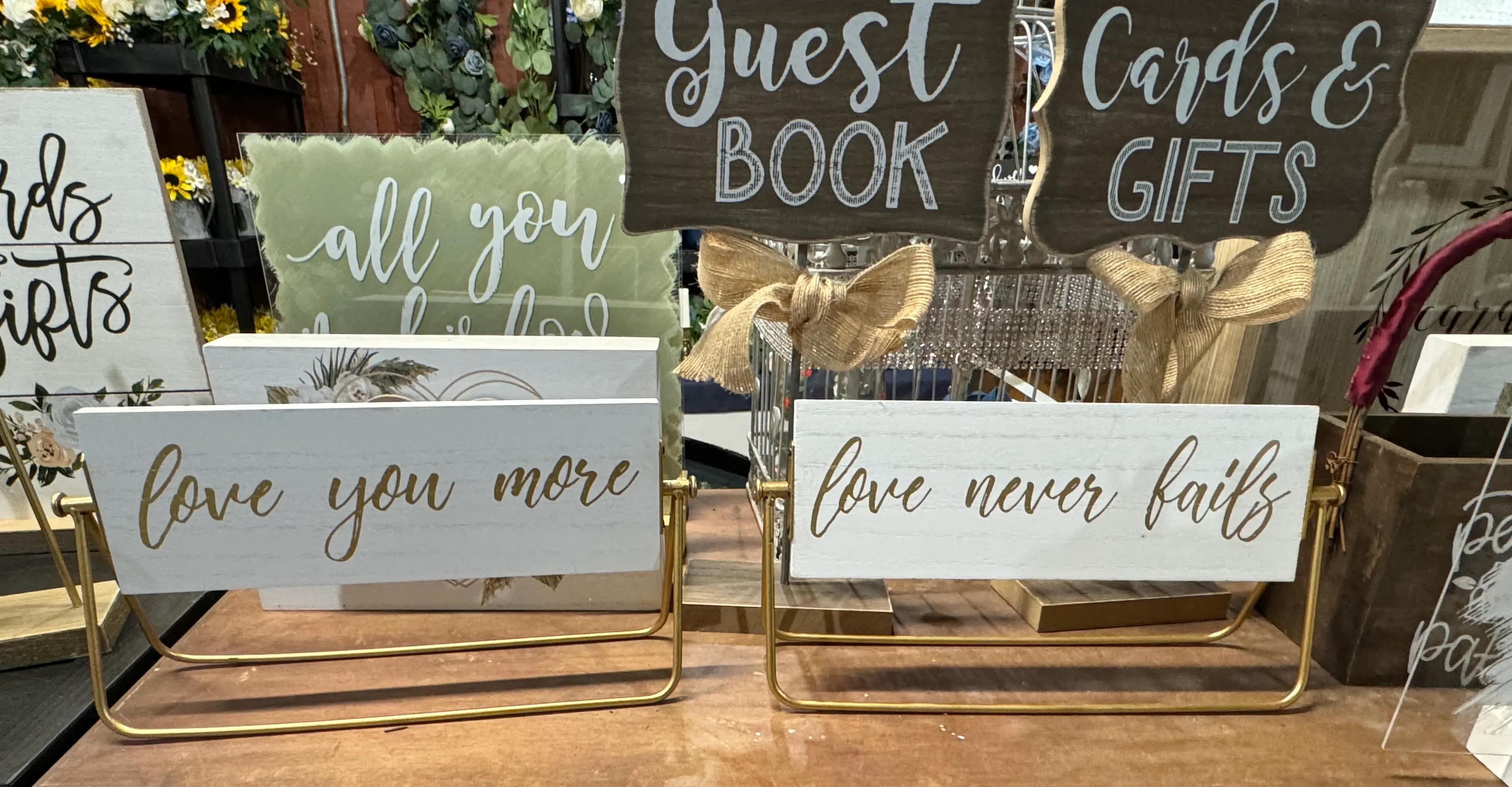 “Love You More” & “Love Never Fails” Signs