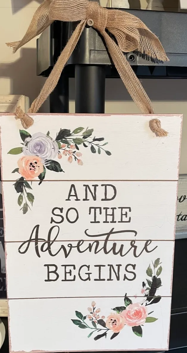 “And So The Adventure Begins” Sign