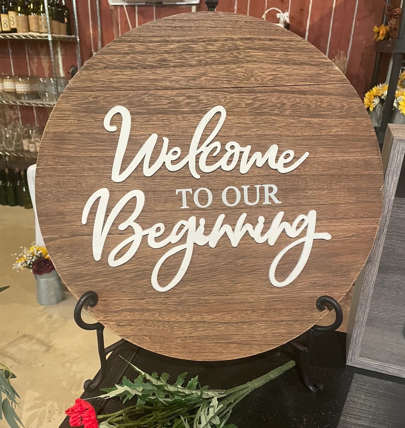 “Welcome to Our Beginning” Brown Round with Easel
