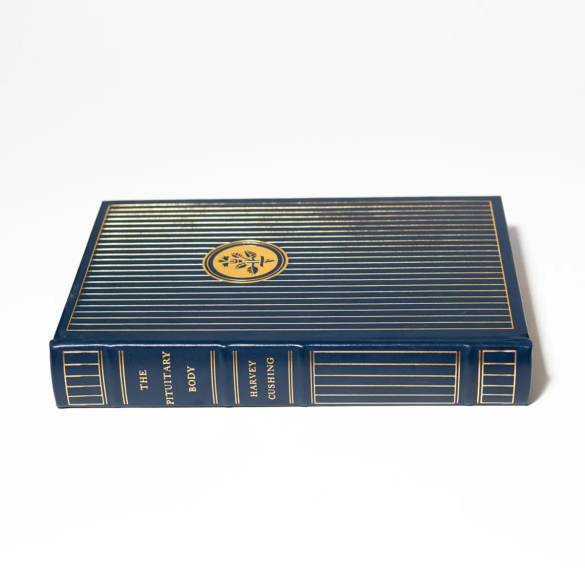 Book: Medical Book The Pituitary Body. Blue Quarter leather with hubbed spine and gilt gold lettering/decoration. Gilded page edges. Silk page marker ribbon