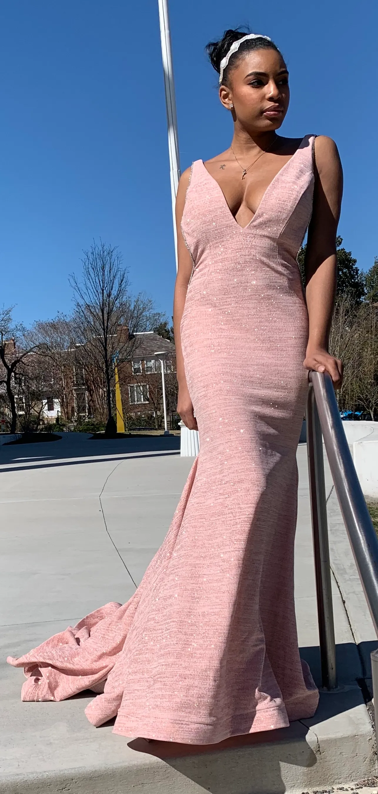 Deep Plunge V Neck Line with Wavy Hem
