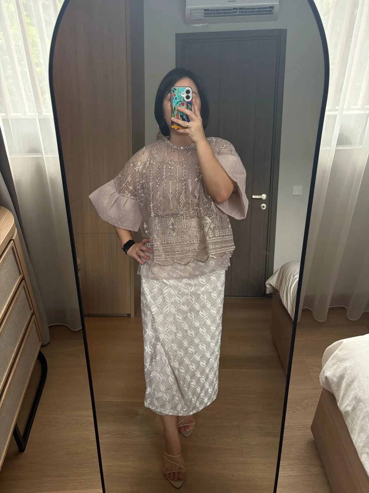 RD-0212A - Dewi Roam - Maudy Top in Nude paired with Lilit Kawung Skirt
