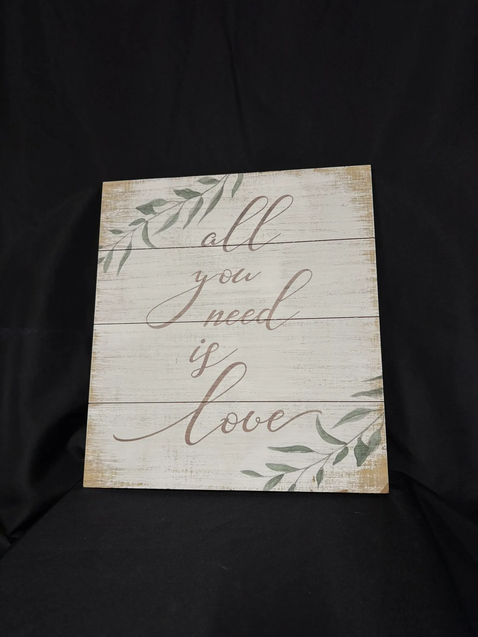 White/Gold "All You Need" Sign
