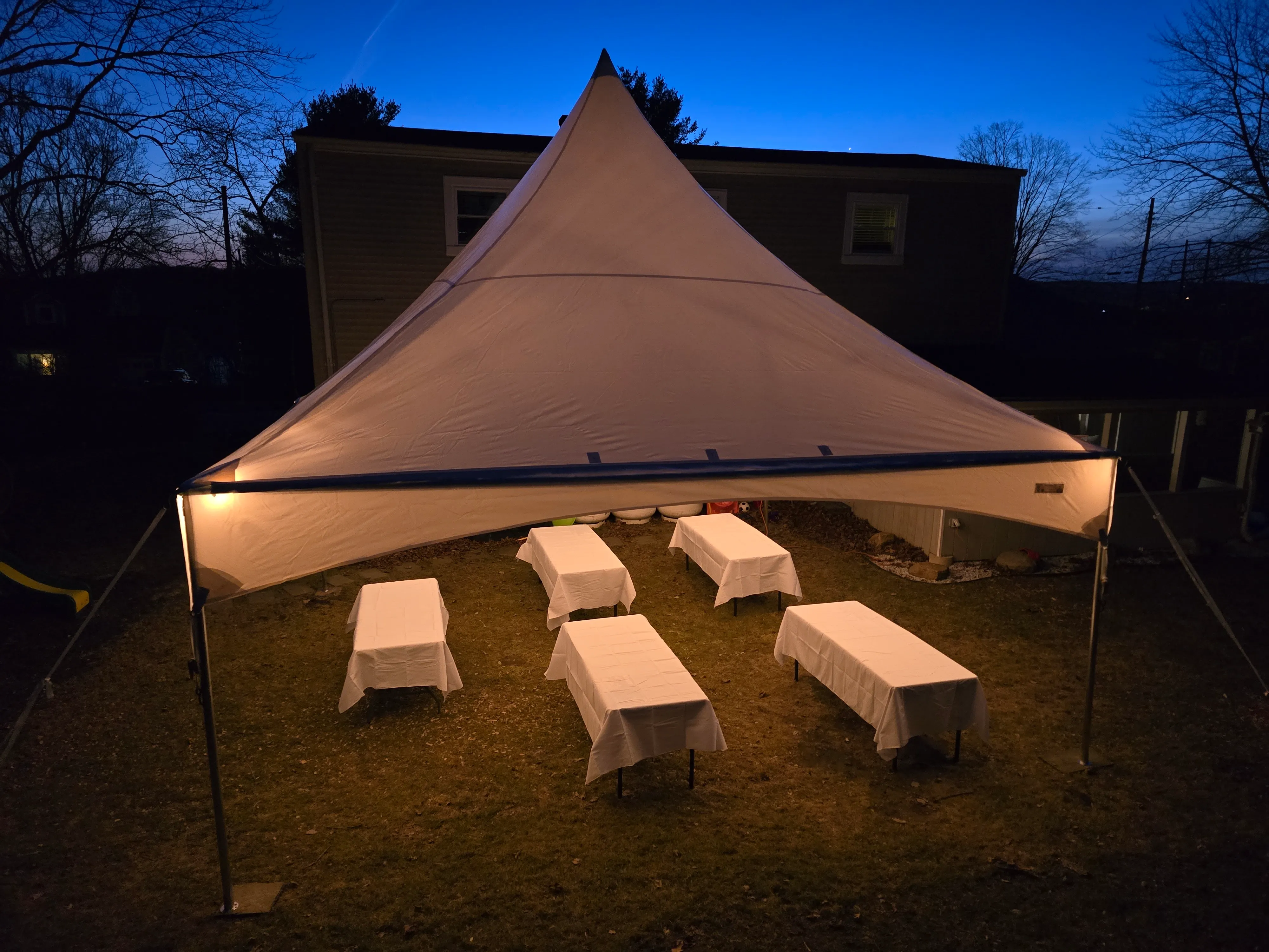 20'x20' Tent Package Standard: Bistro Lights & White Tablecloths (30-40 People) 