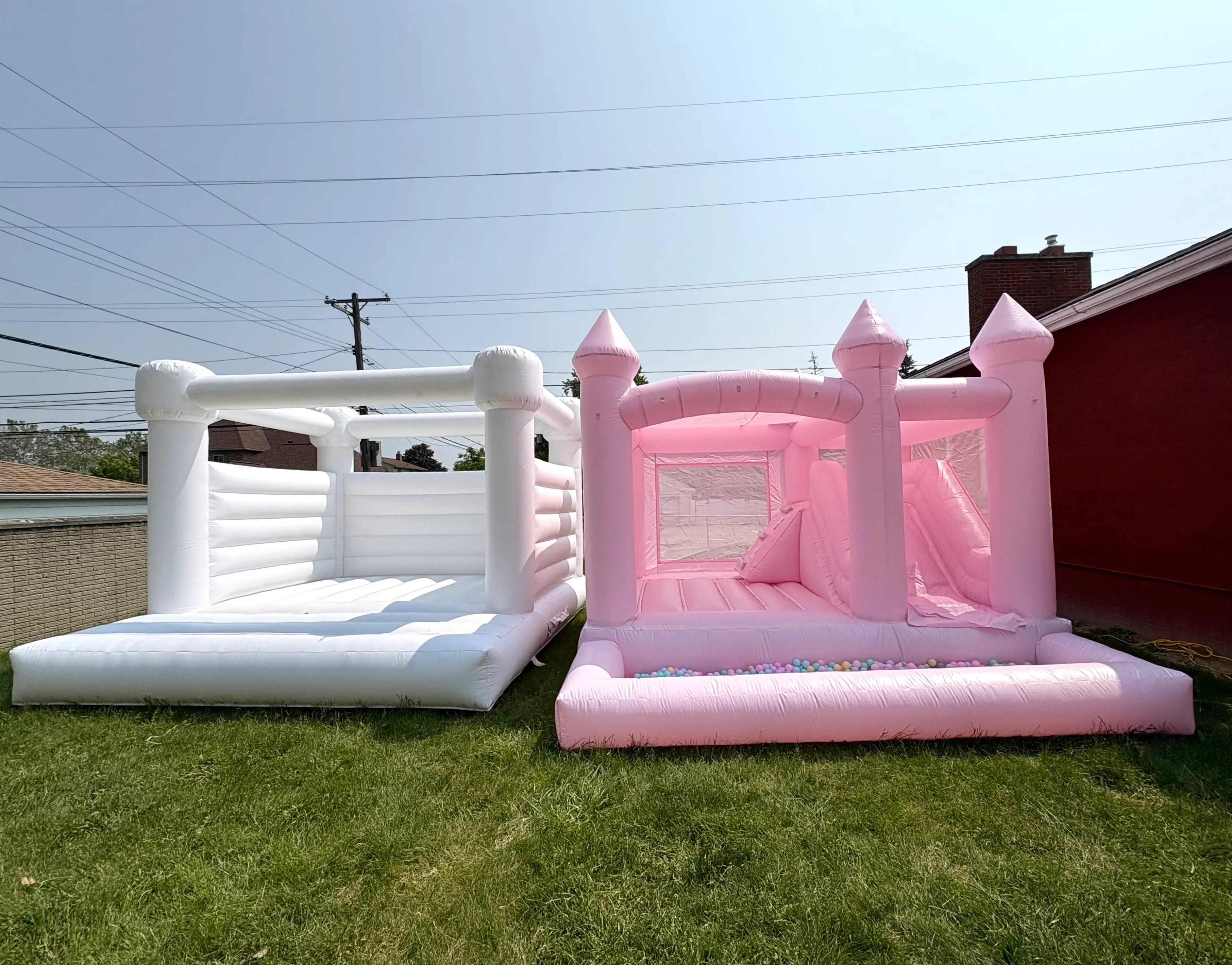 Pastel Pink Inflatable Bounce House with Slide and Ball Pit