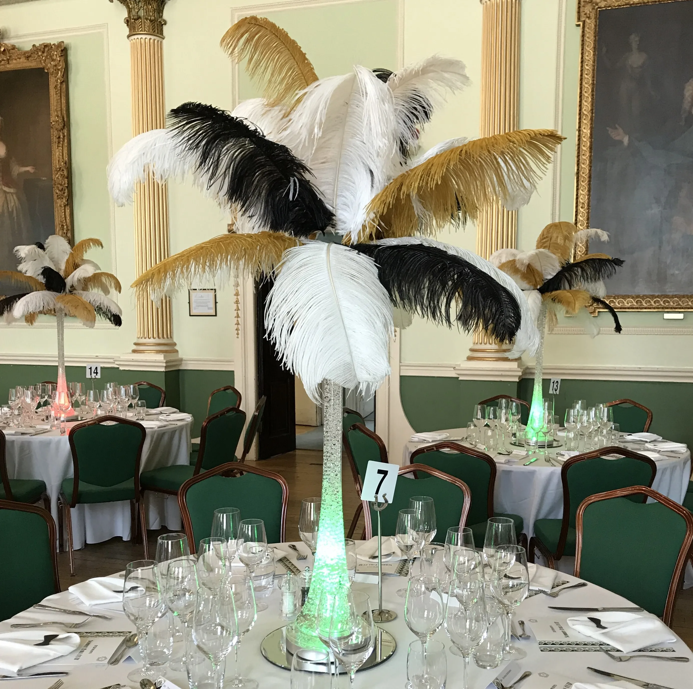 Black, Gold and White Fether Centrepieces Hire