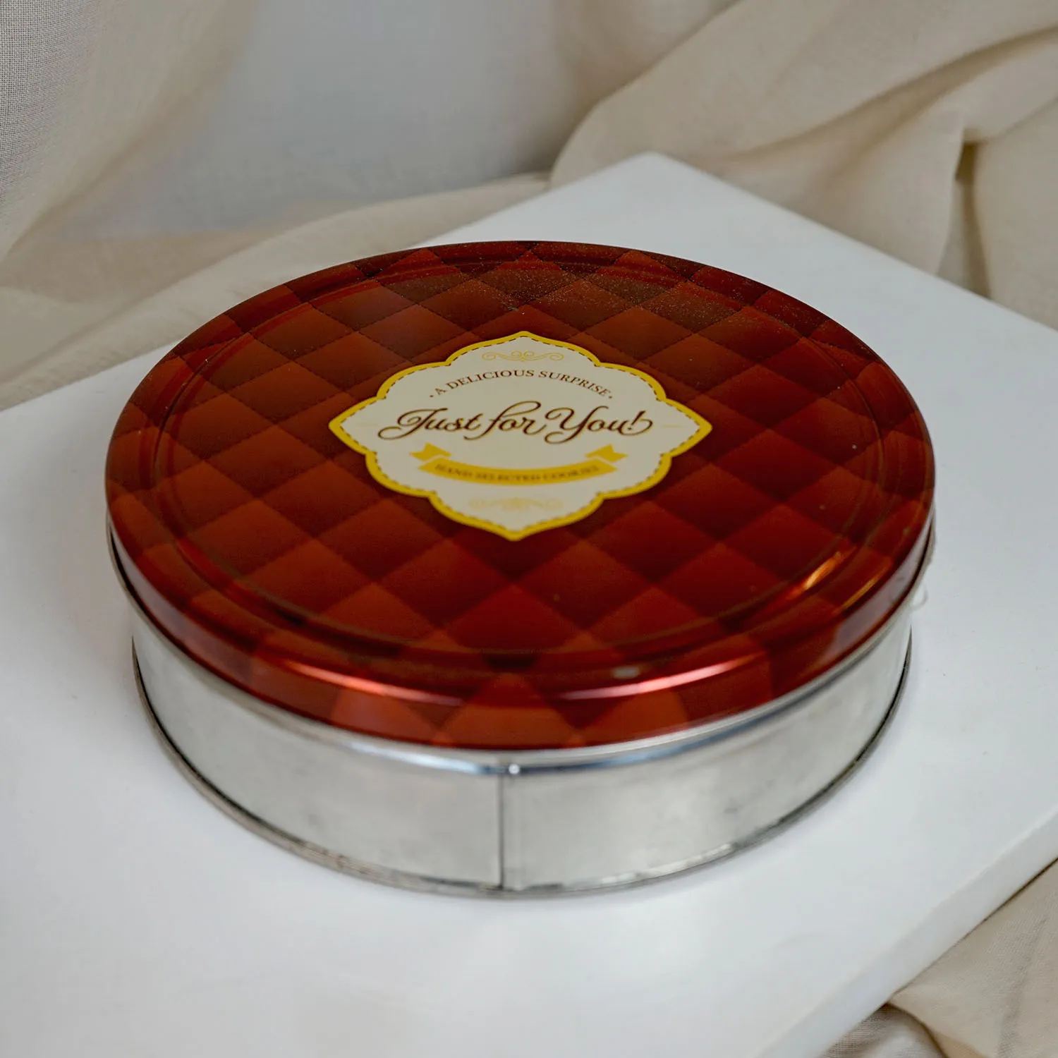 Silver and Red Biscuit Tin