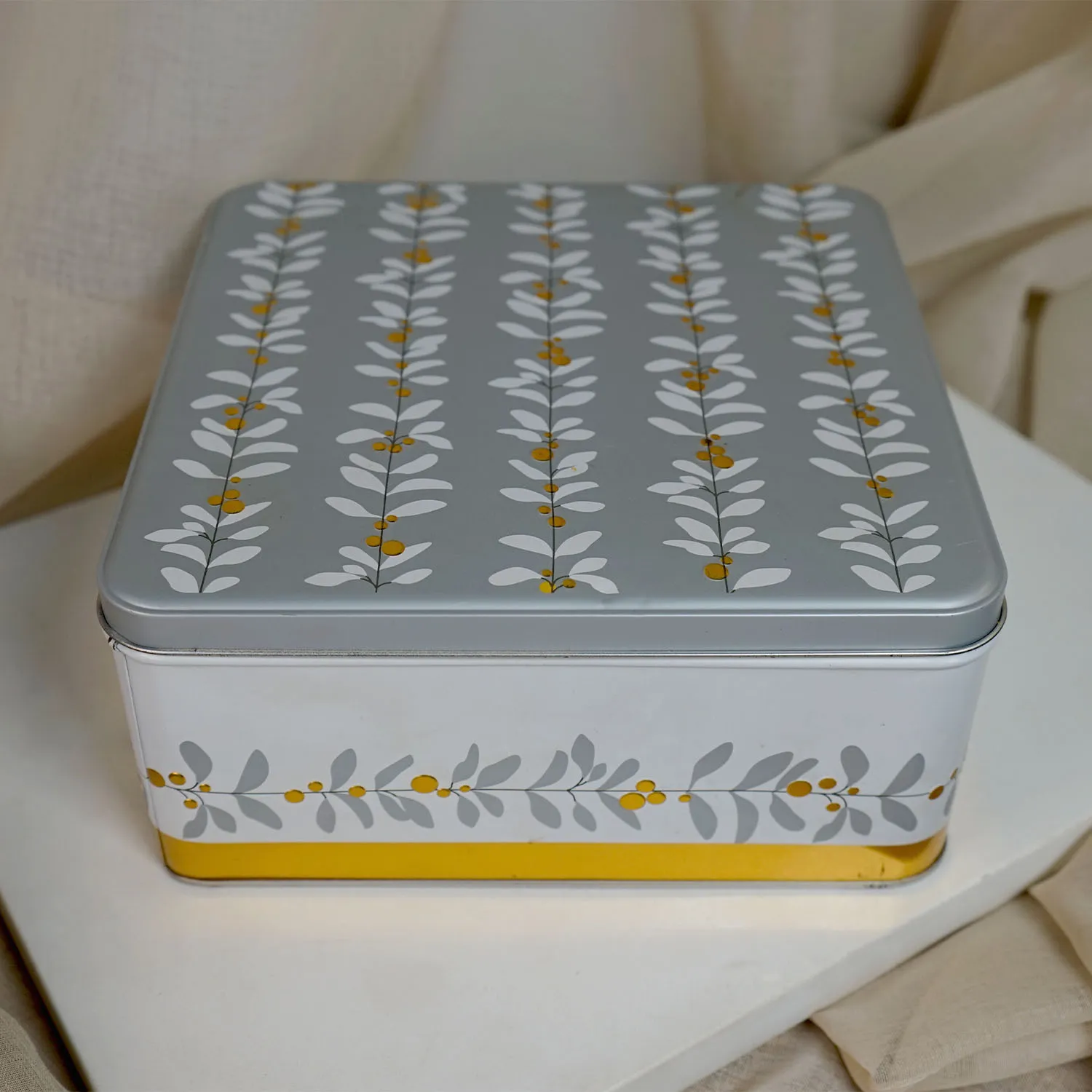 Grey and White Tin