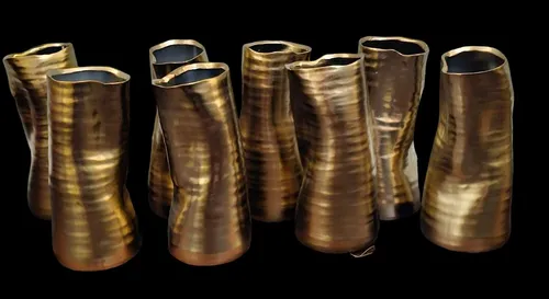 Set of 8 Gold Leaning Vases